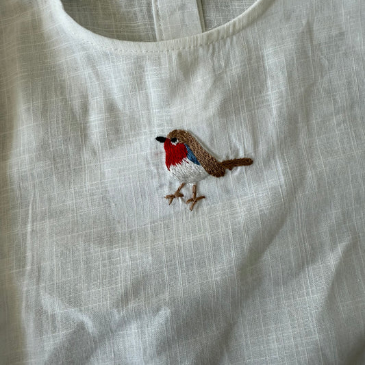 Shirt met geborduurde vogel