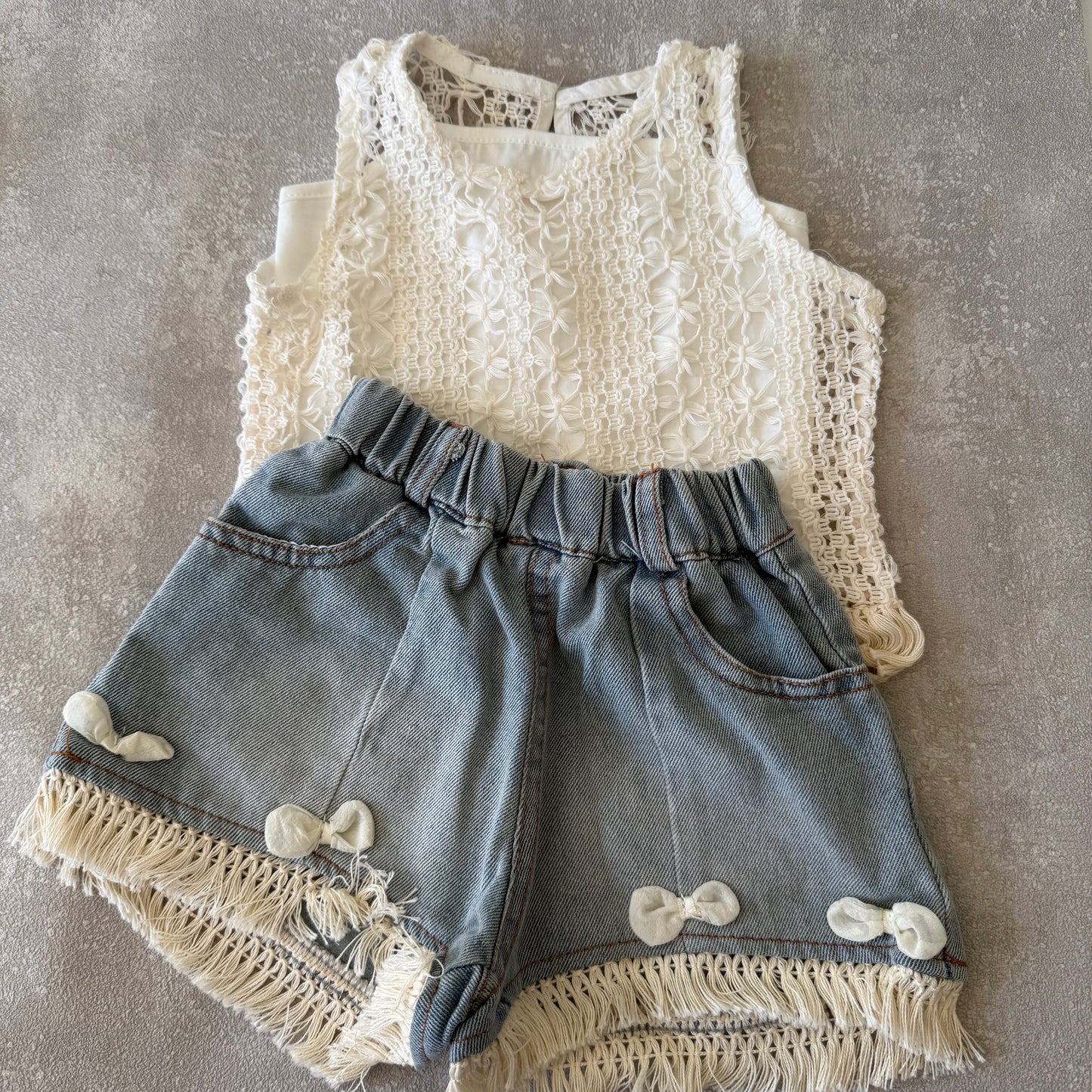 Vest met spijkerbroek