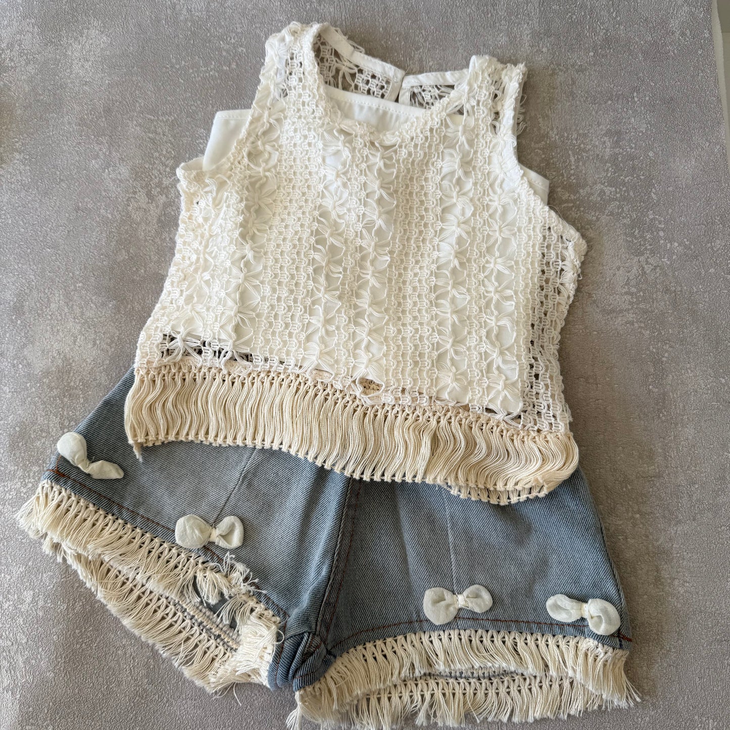 Vest met spijkerbroek