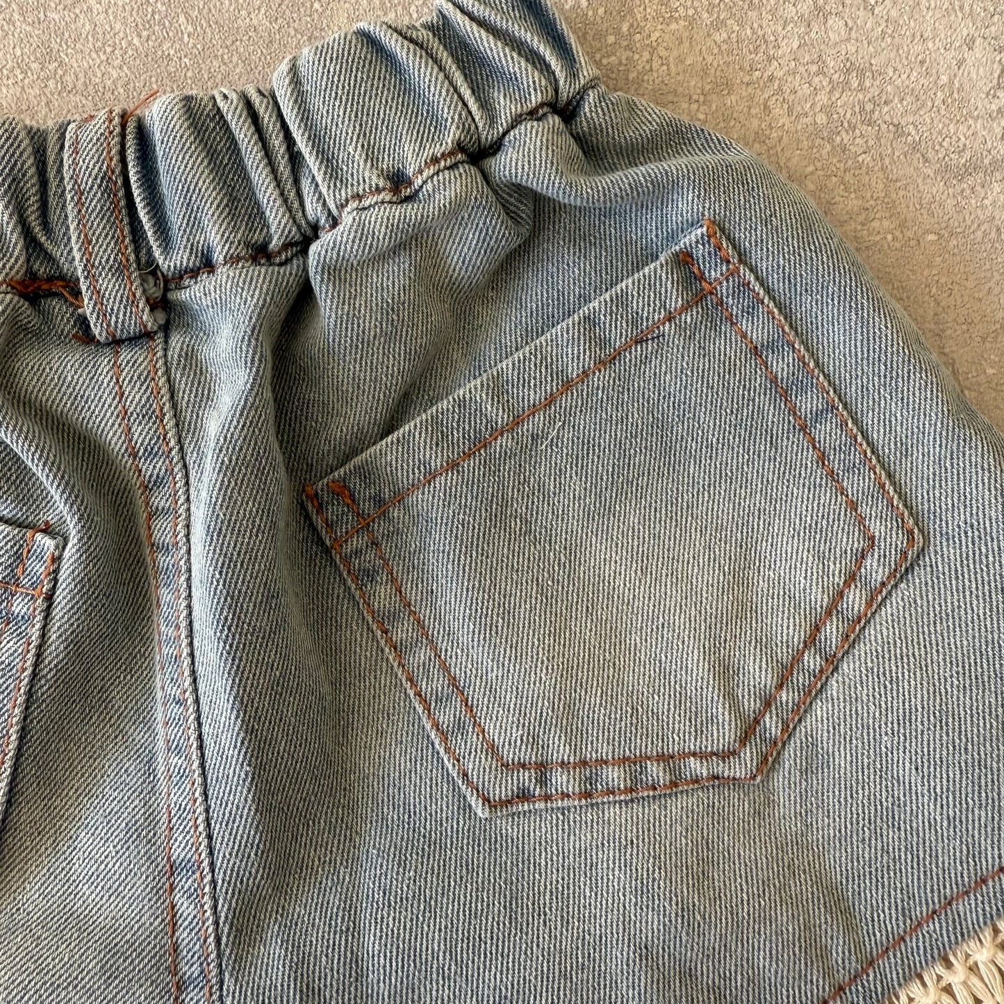 Vest met spijkerbroek