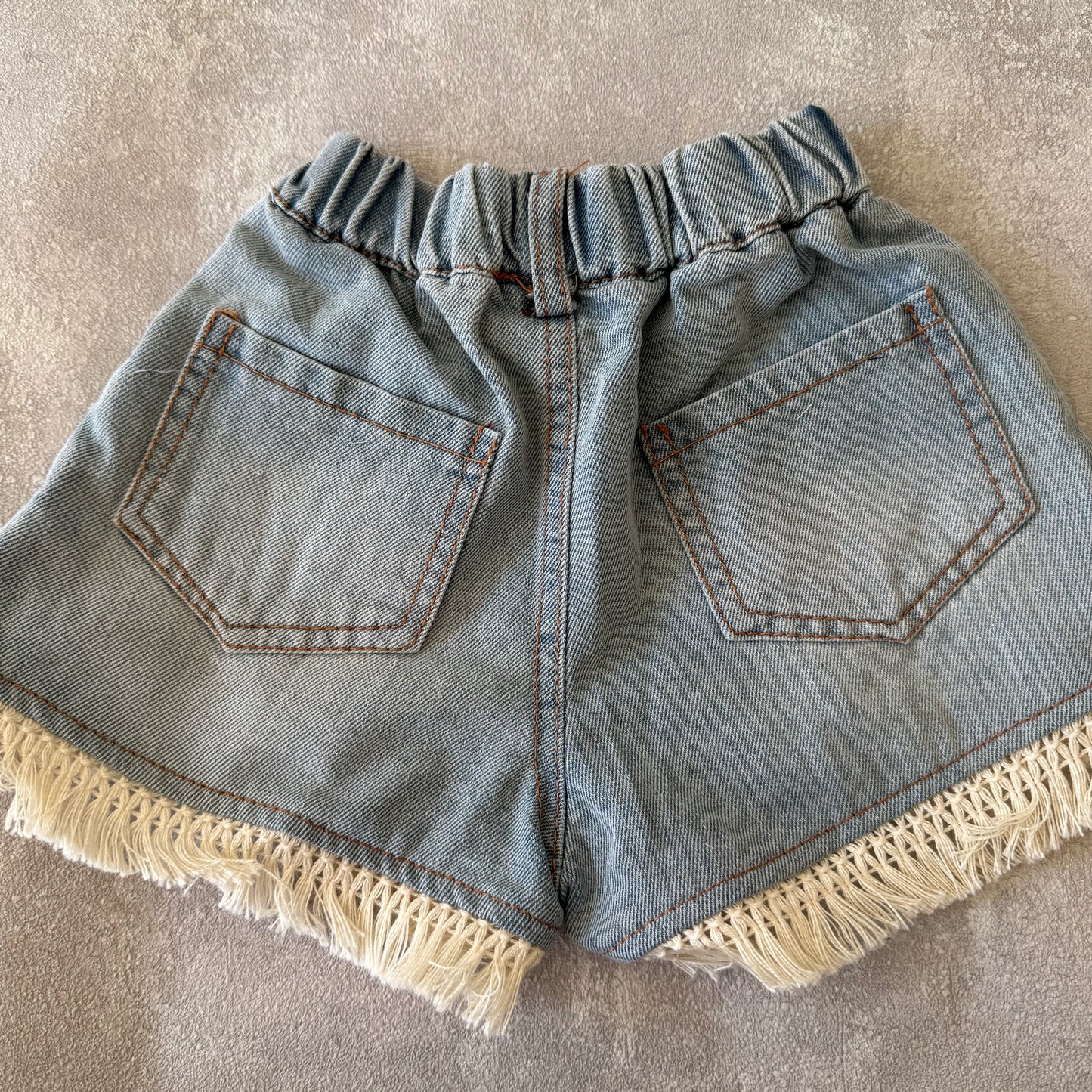 Vest met spijkerbroek