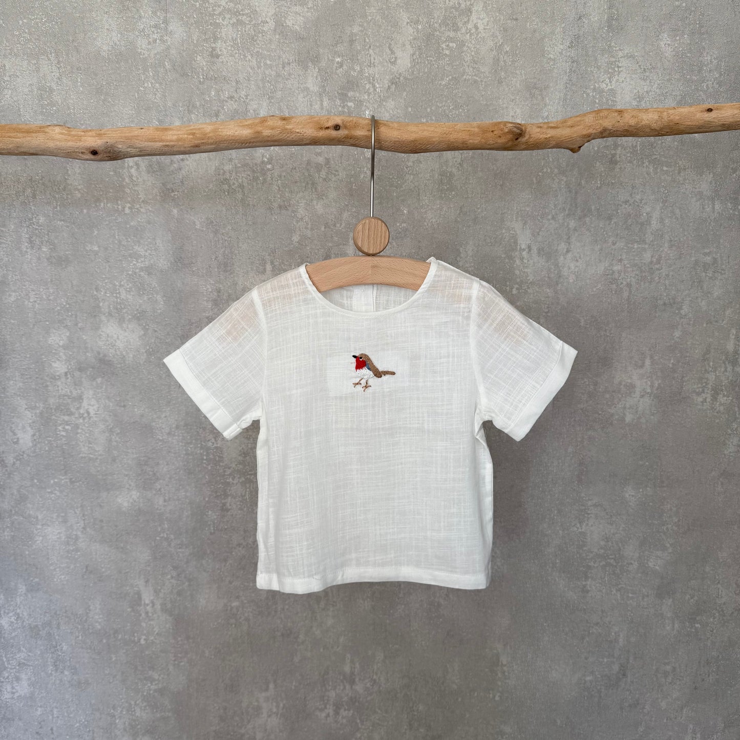 Shirt met geborduurde vogel