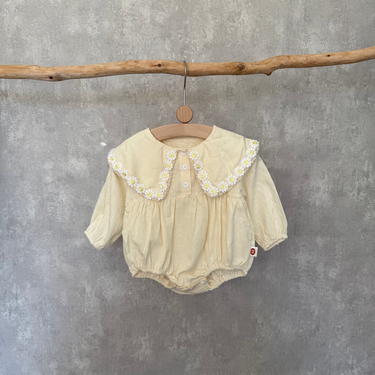 Romper met madeliefjes